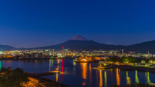 Fuji and the night view of mt. fuji and the factory seen from minato park in fujinokuni