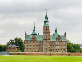 Building against cloudy sky