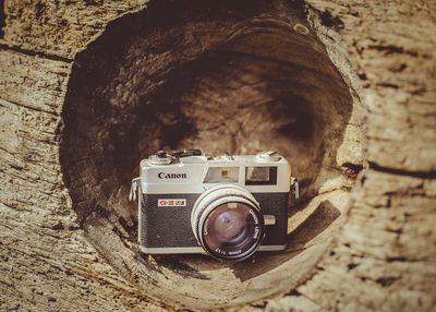 Close-up of camera against wall