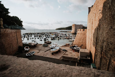 High angle view of sailboats moored on sea