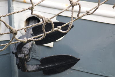 Close-up of rope against boat anchor at st katharine docks