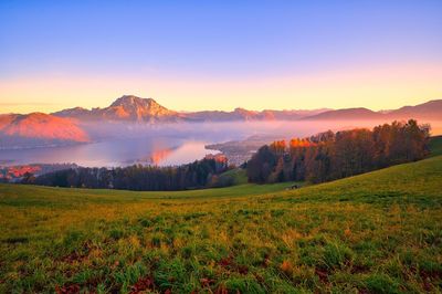 Scenic view of landscape against sky during sunset