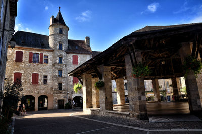 Exterior of old building in city against sky