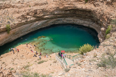 High angle view of people walking on mountain