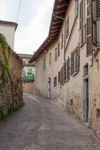 Alley amidst buildings in town