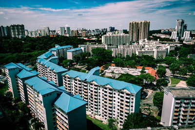 High angle shot of buildings against the sky