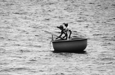 Horse on boat in sea