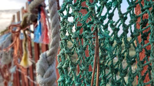 Close-up of clothes hanging on rope