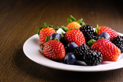 Fresh berry fruits on plate