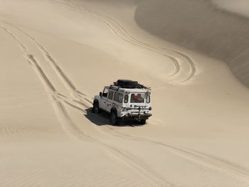 Car on desert land