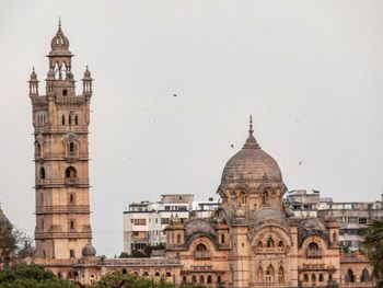 Laxmi vilas palace against building in city