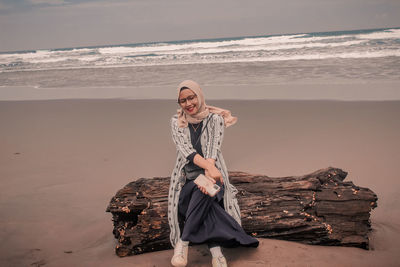 Portrait of young woman on beach