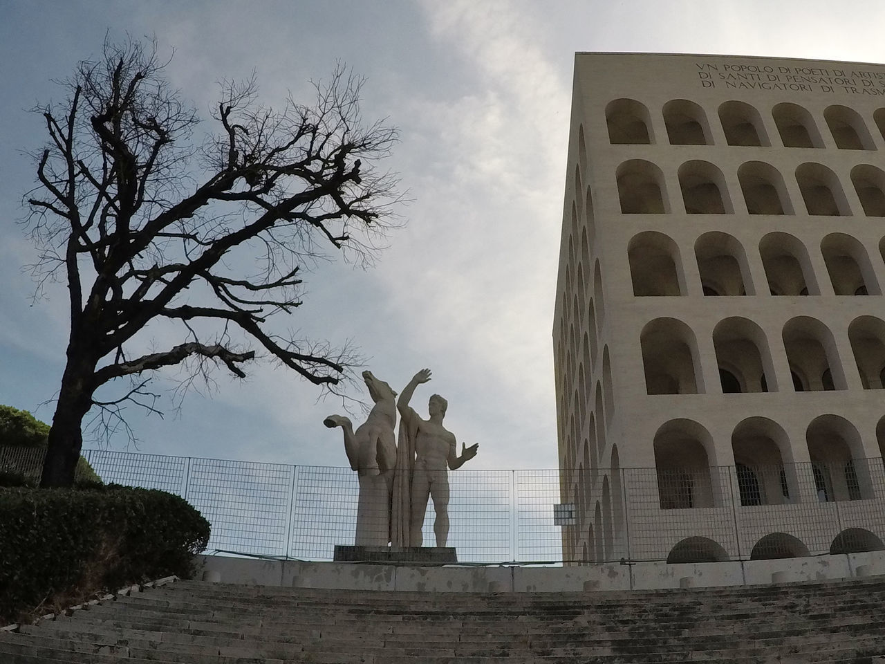 LOW ANGLE VIEW OF STATUES ON BUILDING