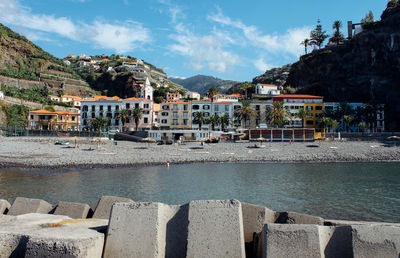 Town with mountain range in background