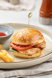 Close-up of burger in plate on table