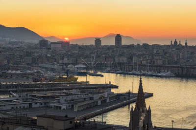 High angle view of cityscape against sky during sunset