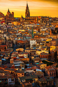 High angle view of city at sunset