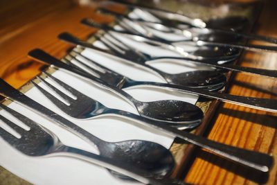 High angle view of silverware arranged on table