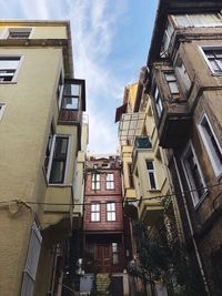 Low angle view of residential building against sky