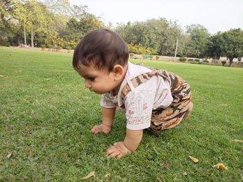 Cute boy on field