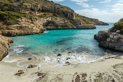 Aerial view of beautiful beach bay cala marmols, mallorca, spain