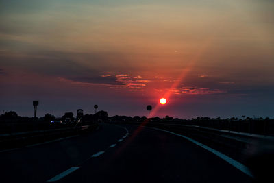 Road against sky during sunset