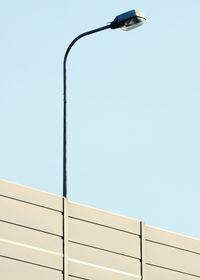 Low angle view of street light against clear sky