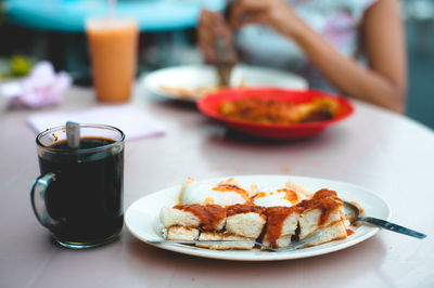 Close-up of food served on table