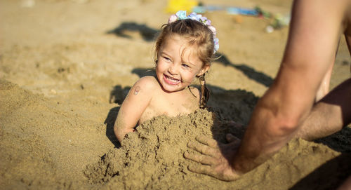 Cute girl on sand at beach