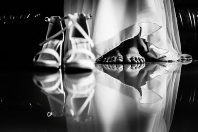 Close-up of glasses on glass table