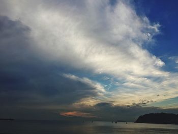 Scenic view of sea against sky at sunset