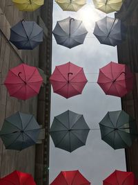 Umbrellas hanging against built structure