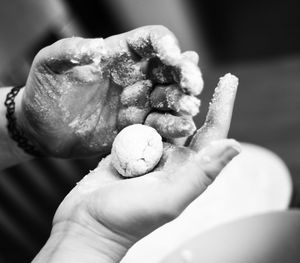 Close-up of hand holding ice cream