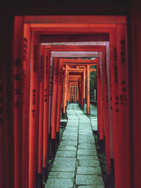 Red wooden gate of building