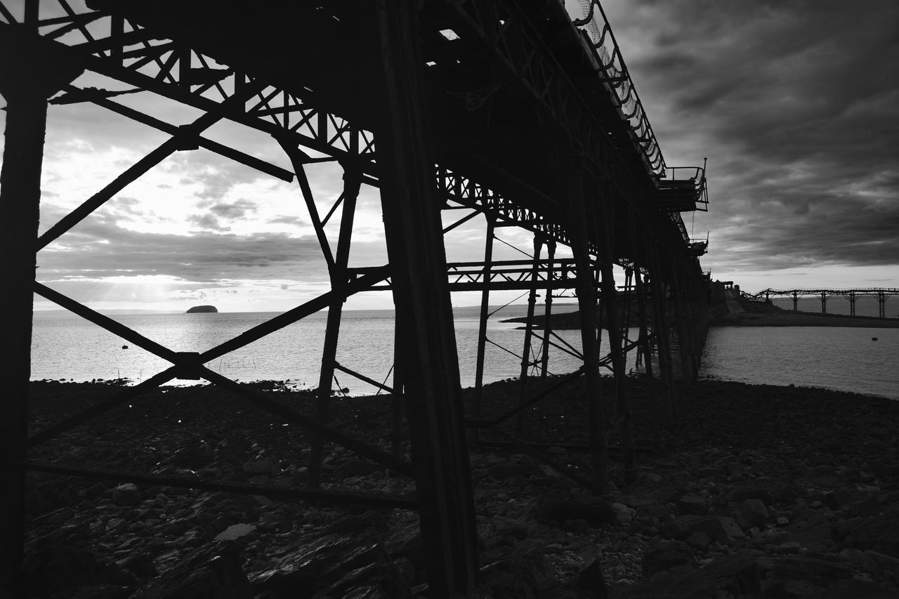 VIEW OF BRIDGE OVER LAKE