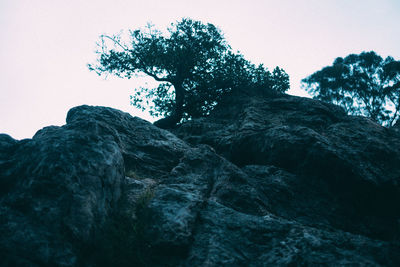 Low angle view of rock formation against clear sky