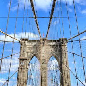 Low angle view of brooklyn bridge against sky