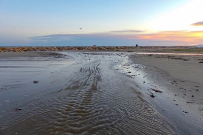 Scenic view of beach during sunset