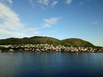 Scenic view of sea against blue sky