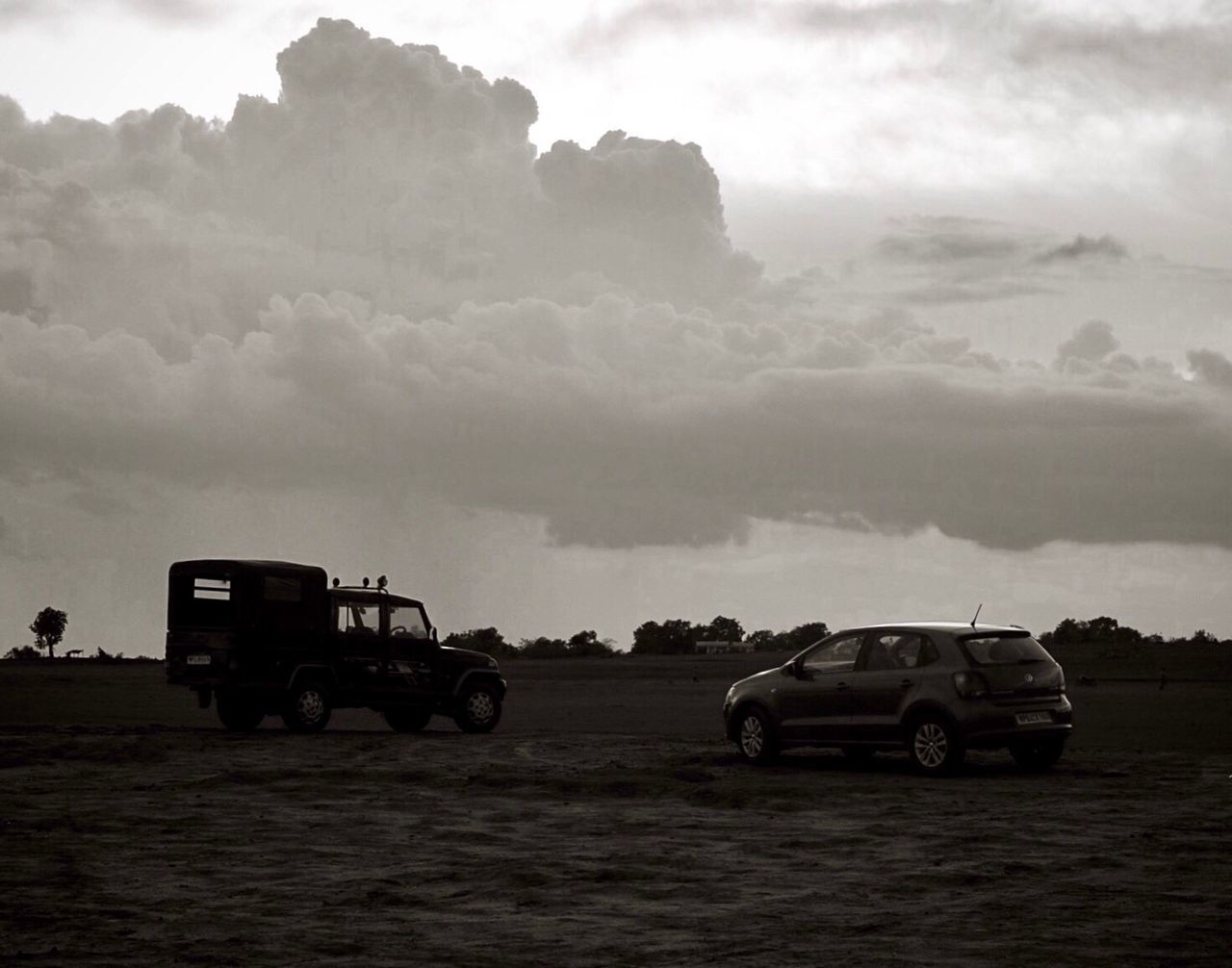 CAR ON LANDSCAPE