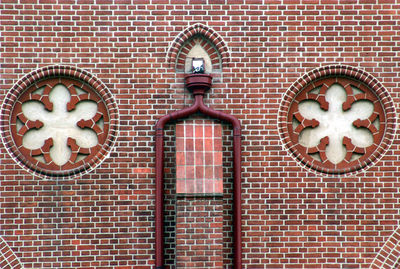 Close-up of art on brick wall