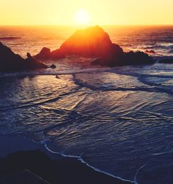 Scenic view of sea against sky during sunset