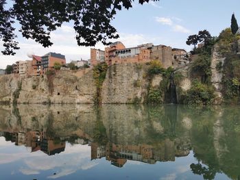 Reflection of buildings on lake