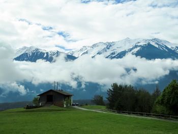 Scenic view of snowcapped mountains against sky