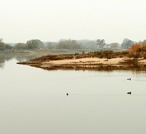 Scenic view of lake against clear sky