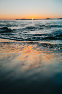 Scenic view of sea against sky during sunset