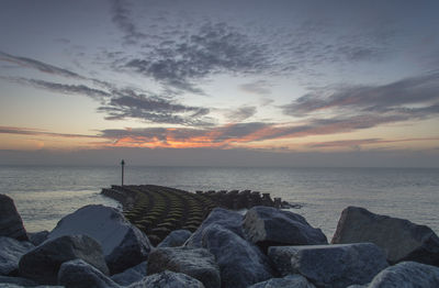 Scenic view of sea against sky during sunset