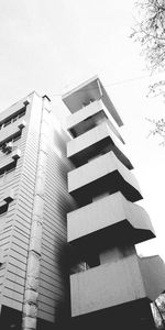 Low angle view of modern building against clear sky