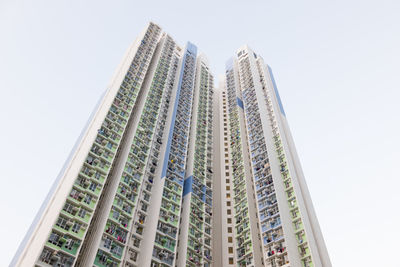 Low angle view of modern buildings against clear sky