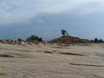 Scenic view of desert against sky